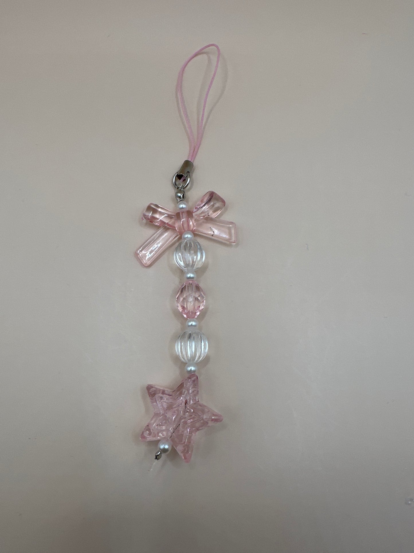 Pink star with bow phonecharm