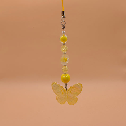 Yellow butterfly phonecharm