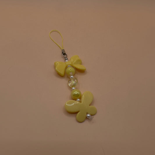 Yellow bow and butterfly phonecharm